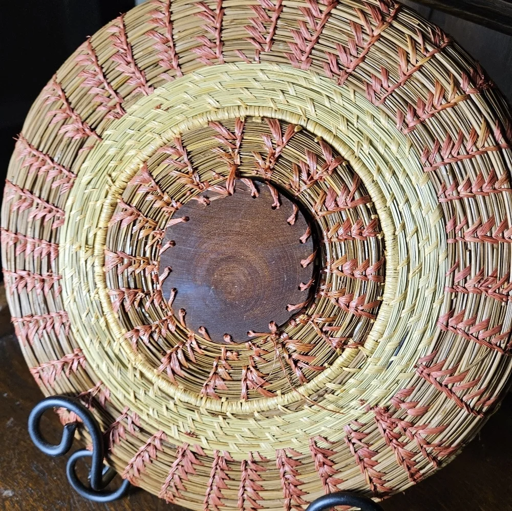 Primitive Handwoven 10 Inche Basket With A Wood Medallian In The Middle.